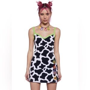 Dolls Kill x Teletubbies Black and White Cow Print Dress with Green Straps